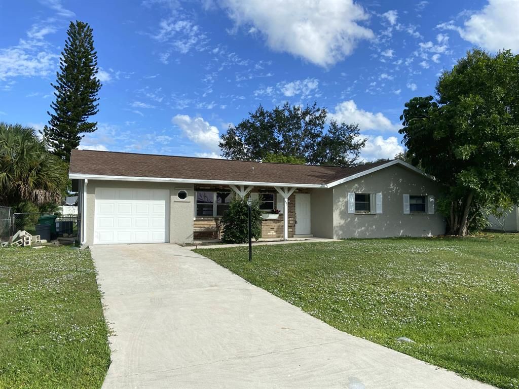 Photo of 607 SE Forgal Street St, Port St Lucie, FL 34983 (MLS # R10748501)