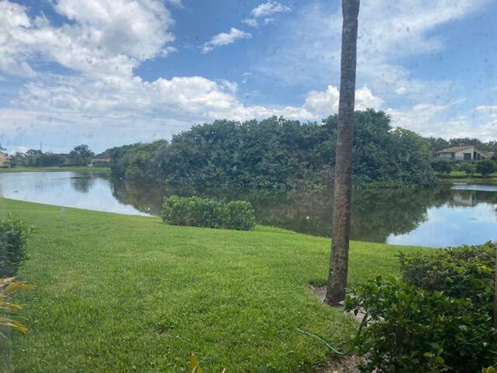 Photo of 5250 Woodland Lakes Drive #127, Palm Beach Gardens, FL 33418 (MLS # R10738891)
