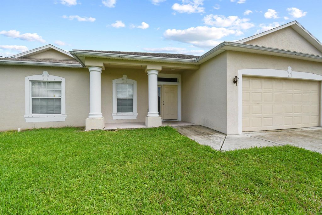 Photo of 6221 NW Hacienda Lane, Port Saint Lucie, FL 34986 (MLS # R11132352)