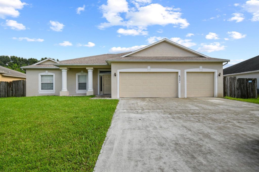 Photo of 6221 NW Hacienda Lane, Port Saint Lucie, FL 34986 (MLS # R11132352)