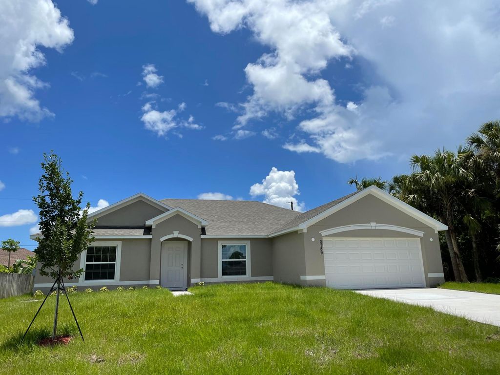 Photo of 3789 SW Swope Street, Port Saint Lucie, FL 34953 (MLS # R11165283)