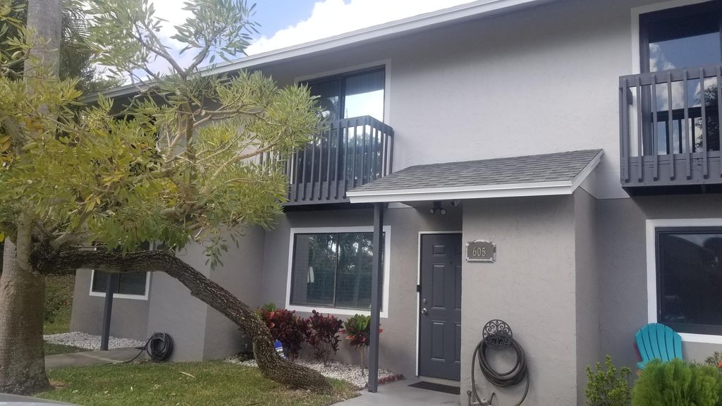 Photo of 605 Riverside Drive, Greenacres, FL 33463 (MLS # R10868229)