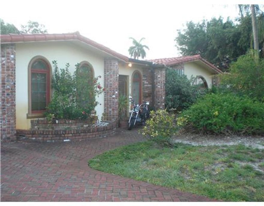 Gorgeous 3/2 house on ocean access canal. Exquisite features as professional kitchen,sauna , stained glass in the guest bathroom, master bath with jaccuzzi, bar, granite counter tops, pass through window, Mexican tile, double sided fireplace also with stained glass a must see. Priced for saleTenant occupied till October.Also listed for rent.