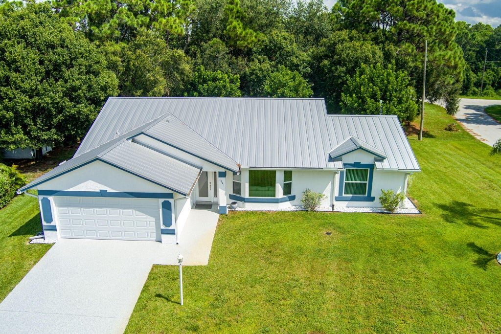 Photo of 1901 SW Yellowtail Avenue, Port Saint Lucie, FL 34953 (MLS # B26069755)