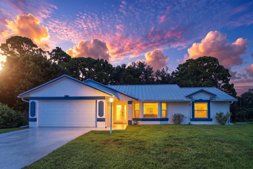 Photo of 1901 SW Yellowtail Avenue, Port Saint Lucie, FL 34953 (MLS # B26069755)