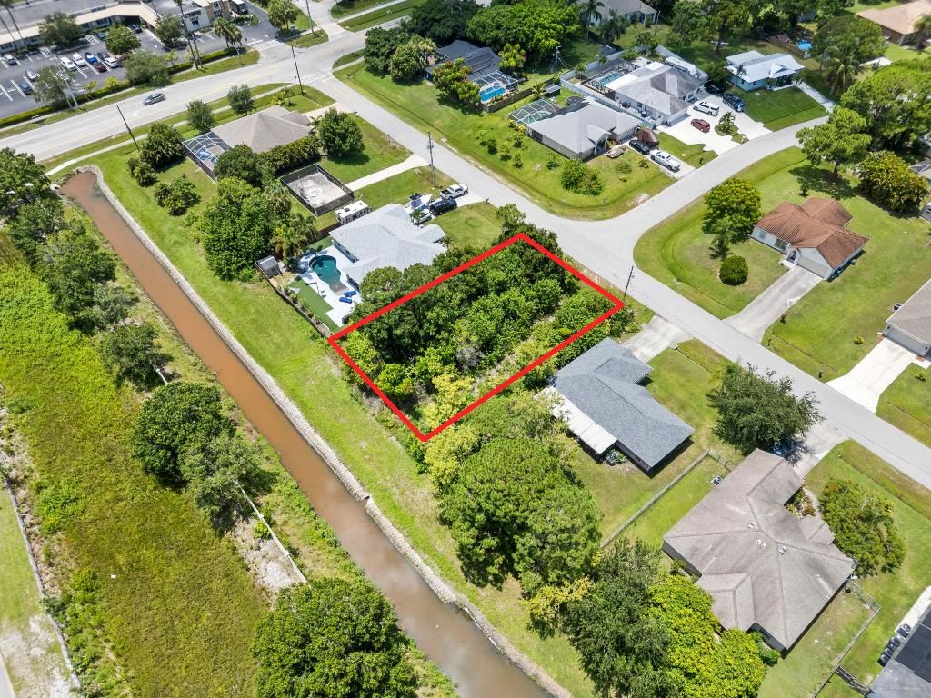 Photo of 2077 SW Americana Street, Port Saint Lucie, FL 34953 (MLS # R11112775)