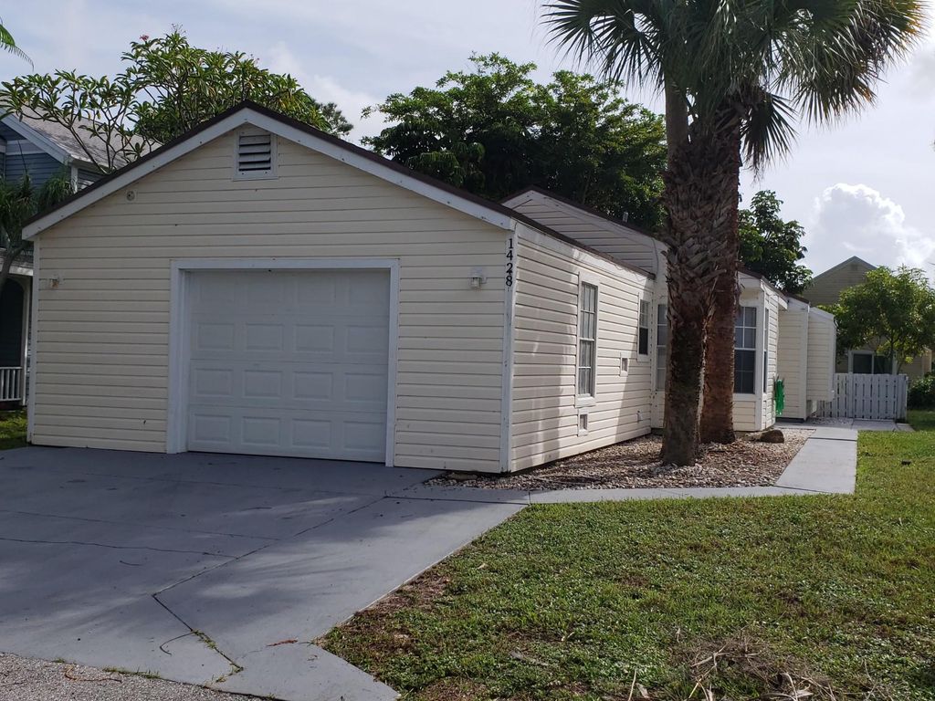 Photo of 1428 Dandelion Lane, West Palm Beach, FL 33415 (MLS # R10810260)