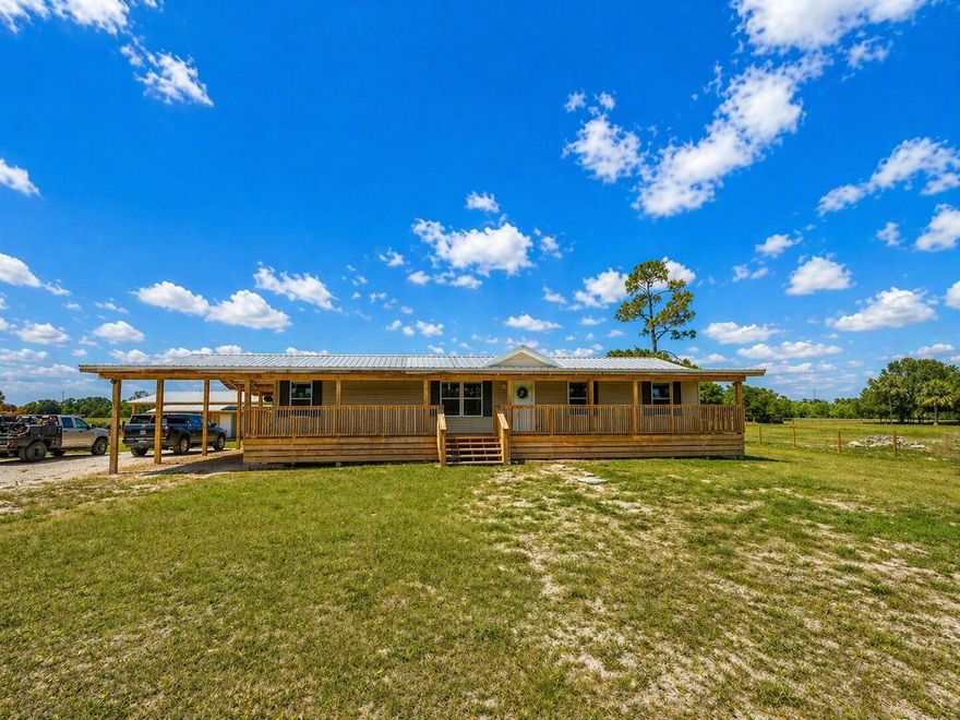 Beautifully maintained property offering the perfect blend of comfort and functionality. This home features a new A/C, newer water heater, and a metal roof only 4 years old, giving peace of mind for years to come. Enjoy relaxing mornings and evenings on the front and back porches overlooking a picturesque pond. The property is fully equipped for animals with cross fencing, two separate paddocks, and a 2-stall barn with feed and tack room. A brand new 36x72x12 barn adds incredible value and versatility. The long private driveway provides added privacy and a welcoming entrance. Ideal for those seeking country living with room to grow!