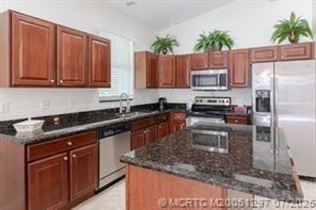 Photo of 1446 SE Tidewater Place, Stuart, FL 34997 (MLS # B26023258)