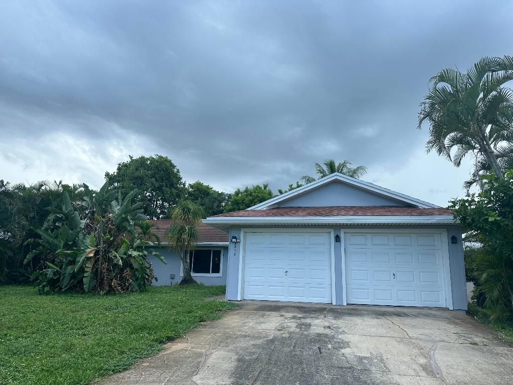 Photo of 8812 SE Sandridge Avenue, Hobe Sound, FL 33455 (MLS # R11145321)