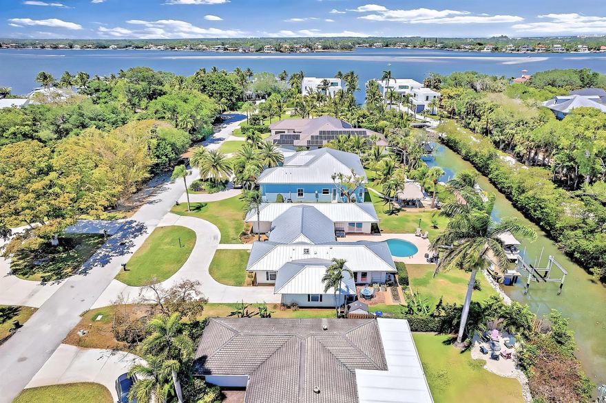 🏡 940 Turner Quay, Jupiter, FL - Public RemarksWide water views. One of Jupiter's rarest treasures.Step into coastal perfection with this fully remodeled, meticulously reimagined waterfront estate, no fixed bridges, ideally positioned on an oversized half-acre lot with 135+ feet of wide water frontage -- just minutes to the Jupiter Inlet.Every inch of this residence has been completely reconstructed to deliver a fresh, elevated living experience -- from the brand-new 40-year metal roof (2022) to the designer-crafted interiors that blend classic Hamptons elegance with effortless Florida style.Notable Features:✅ Brand-new dock (2023) + 16,000 lb. boat lift (2020) -- ideal for any center console or sportfish yacht✅ All new hurricane-impact skylights (2020) +