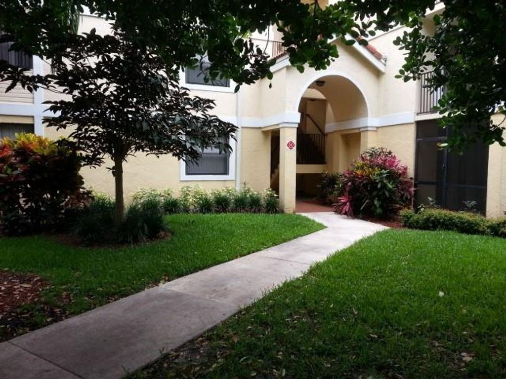 Photo of 10135 W Sunrise Blvd #101, Plantation, FL 33322 (MLS # F10300665)