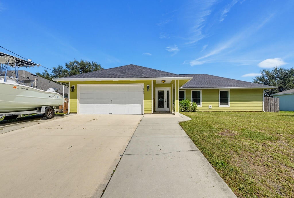 Photo of 1817 SW OPEN VIEW Drive, Port Saint Lucie, FL 34953 (MLS # B26081724)