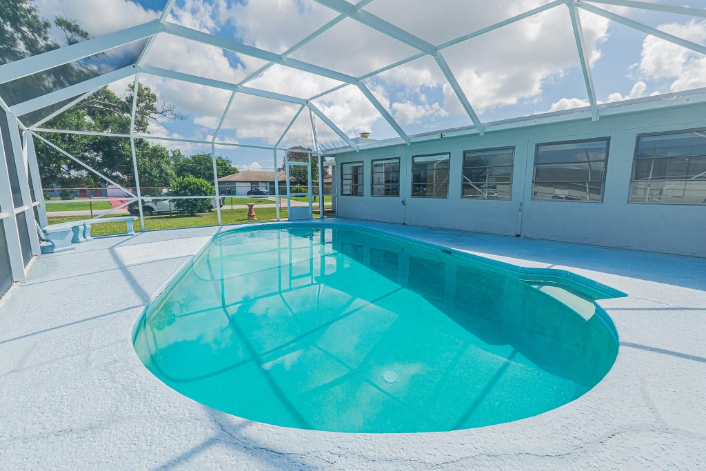 Photo of 188 NW Broadview Street, Port Saint Lucie, FL 34983 (MLS # B26037448)