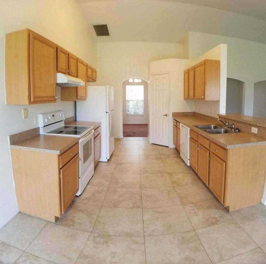 Photo of 1202 SW Albenga Avenue, Port Saint Lucie, FL 34953 (MLS # R11001682)