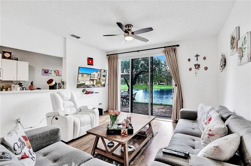 Beautiful Waterfront 3/2.5 Allegro Townhome with 1 car garage, within close distance to Sawgrass Mall, grocery stores, restaurants, IKEA, BB&T and much more. This move-in ready home has Brand New Stainless Steel Appliances, RainSoft Water Filtration System, Pergo laminated floor on the first floor and Accordion Shutters. Open Living room and Kitchen layout, Master Bedroom with private bath, dual vanity and a large walk-in closet, spacious bedrooms and full size washer and dryer. Enjoy your morning coffee  with the sunrise or a cocktail with the sunset while enjoying the wonderful water views from the patio. Community Pool, Playground, walking/biking path, minutes to I-75, I-595.