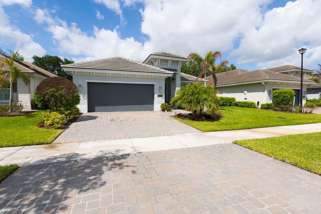 Photo of 12621 SW Sunrise Lake Terrace, Port Saint Lucie, FL 34987 (MLS # B26014176)