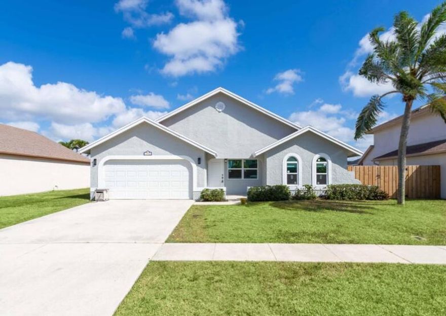 Pool home in Boca Raton! Single story, open concept, spacious and updated. This single story home is in a great family oriented community. Hurricane impact windows and sliders, updated kitchen, beautiful cabinets (lots of storage), stainless steel appliances. Home also features vaulted ceilings, an outdoor terrace with full size private pool! Plenty of room in the yard for children and pets. Great sought after Boca Winds neighborhood, A-rated school district. Minutes to South County Regional, with walking/bike trails, recreational activities, public golf, dog park, kids water park, amphitheater and more! This home is close to shopping, movie theater and plenty of restaurants. New AC! Extra fridge in the 2 car garage. A Must See!