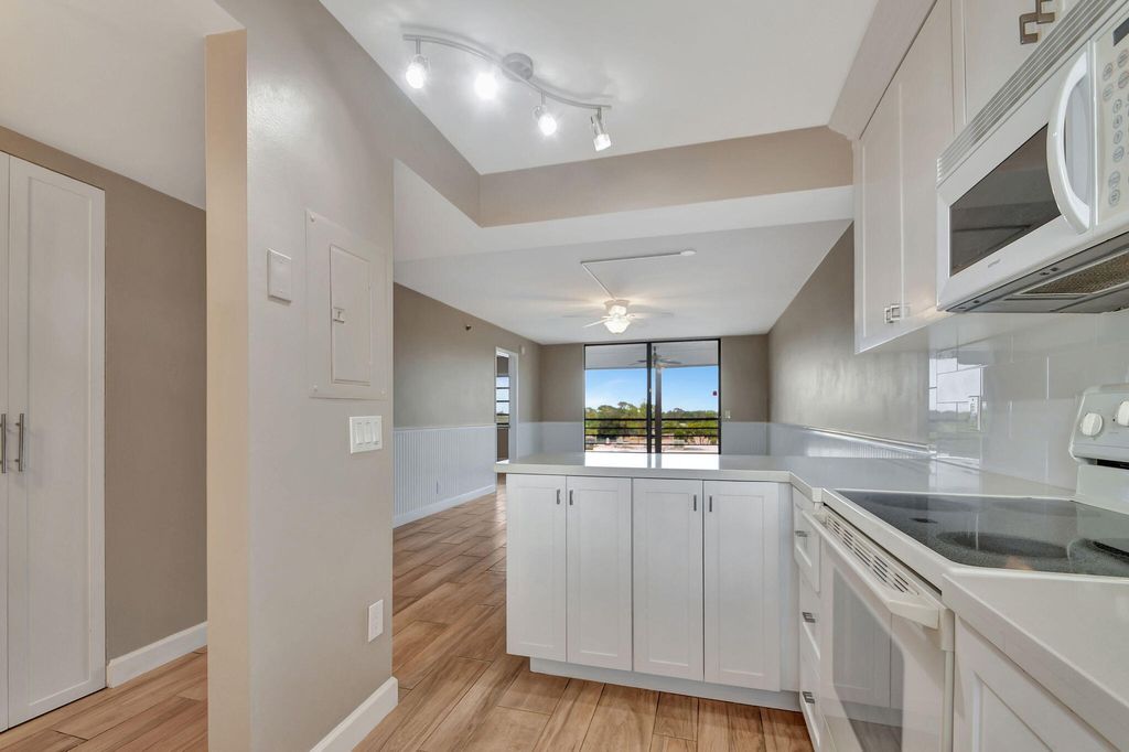 Photo of 4640 W Lucerne Lakes Blvd Blvd W #502, Lake Worth, FL 33467 (MLS # B26021857)