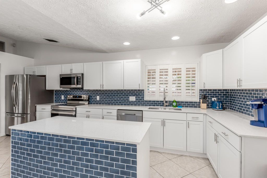 Photo of 2256 SE Longhorn Avenue, Port Saint Lucie, FL 34952 (MLS # R10947896)