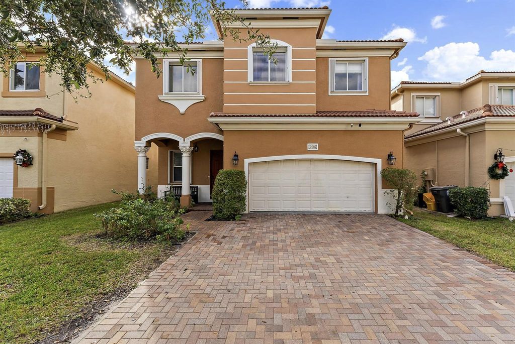 Photo of 206 Gazetta Way, West Palm Beach, FL 33413 (MLS # R11085738)