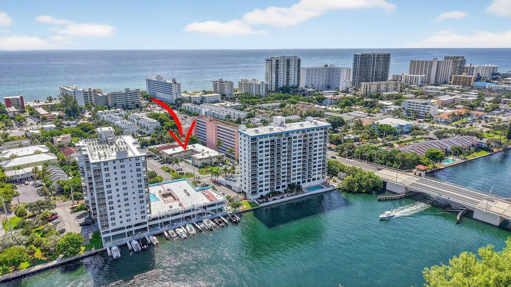 Photo of 1450 N Riverside Drive #102, Pompano Beach, FL 33062 (MLS # F10542420)