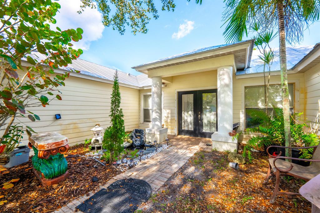 Photo of 1037 SW Majorca Avenue, Port Saint Lucie, FL 34953 (MLS # R10945992)