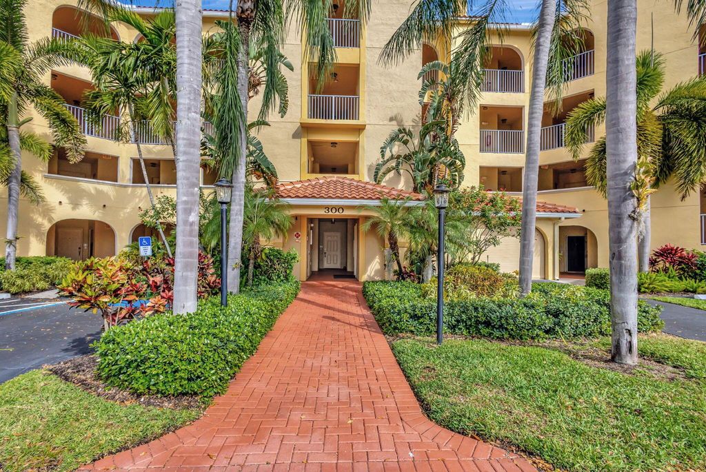 Photo of 300 Uno Lago Drive #101, Juno Beach, FL 33408 (MLS # R11069302)