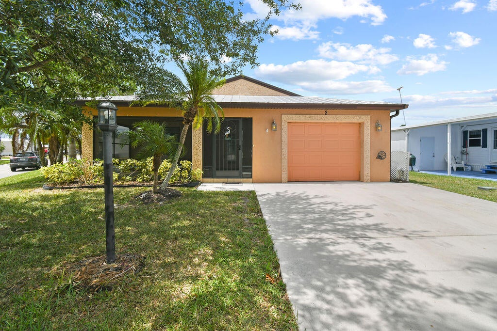Photo of 2 Guava Lane, Port Saint Lucie, FL 34952 (MLS # R10995374)