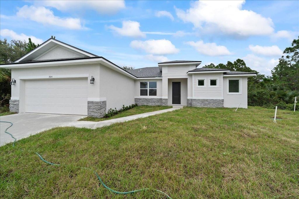 Photo of 5007 Hickory Drive, Fort Pierce, FL 34982 (MLS # R11140357)
