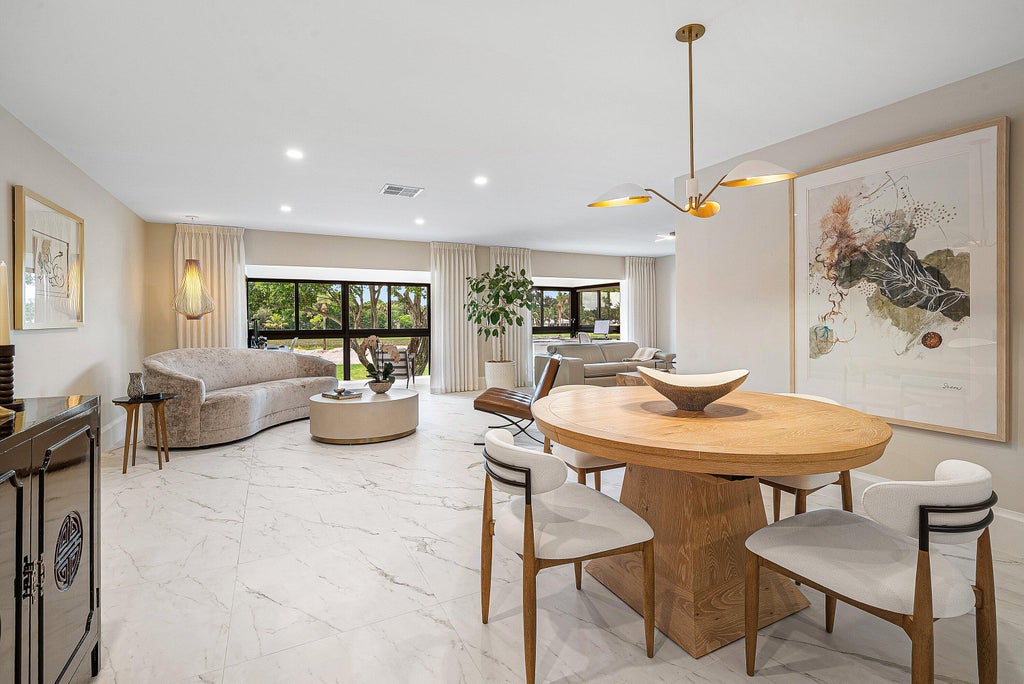 Photo of 12 Southport Lane #D, Boynton Beach, FL 33436 (MLS # B26062830)