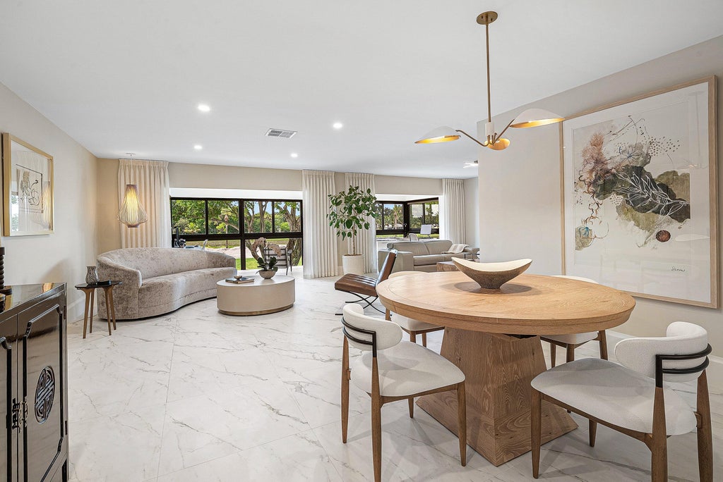 Photo of 12 Southport Lane #D, Boynton Beach, FL 33436 (MLS # B26062830)
