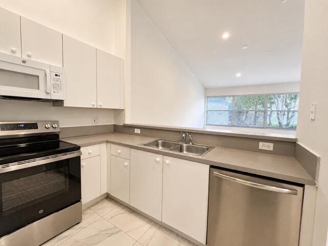 Photo of 2480 S Coral Trace Circle S, Delray Beach, FL 33445 (MLS # B26038614)