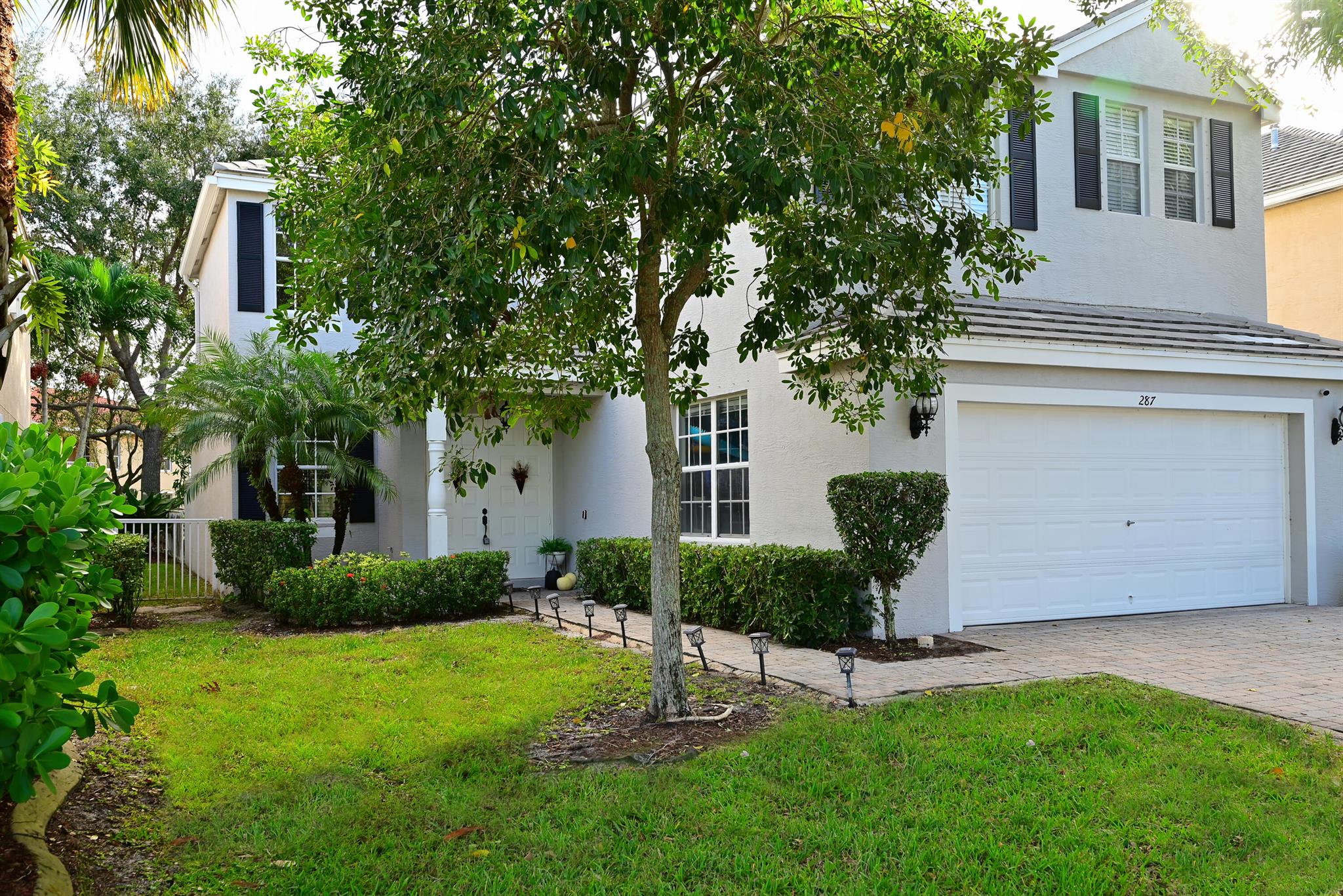 Don't miss this incredible home! Beautifully maintained by a Professional Organizer. Spacious living space downstairs with upgraded kitchen including SS gas appliances, den & wet bar. Brand new A/C, 3 bedrooms upstairs including an oversized space that can be used as a 4th bedroom, large playroom or office. Enjoy the outdoors in your lovely screeded in patio. HOA covers all lawncare, except trees on property, lawn irrigation, exterior pest control, internet, cable, alarm system, manned guard gate & clubhouse & pool.