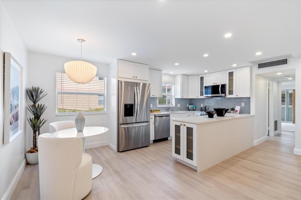 Photo of 628 Saxony N Lane #628, Delray Beach, FL 33446 (MLS # R11038559)