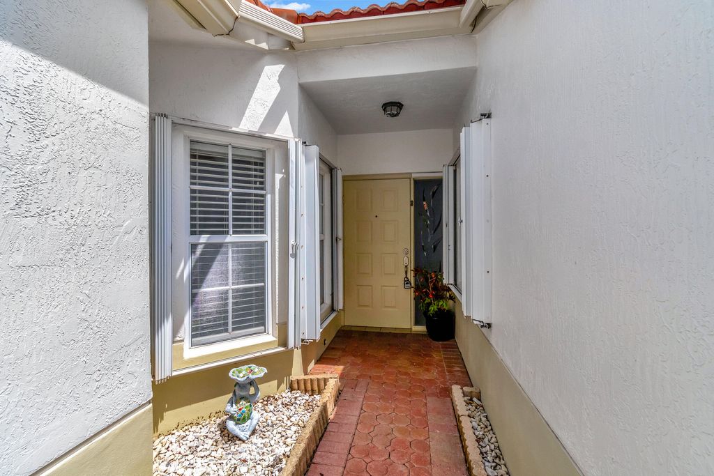 Photo of 6073 Lake Hibiscus Drive, Delray Beach, FL 33484 (MLS # R11013088)
