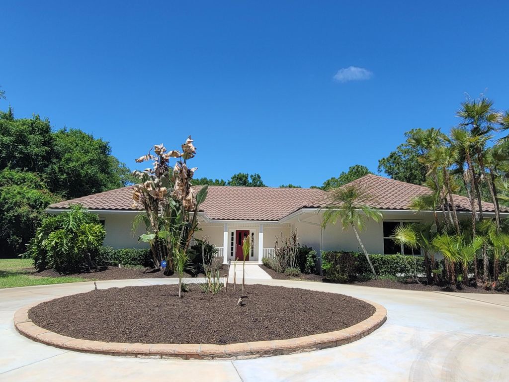 Photo of 7922 Steeplechase Lane, Port Saint Lucie, FL 34986 (MLS # B26011084)