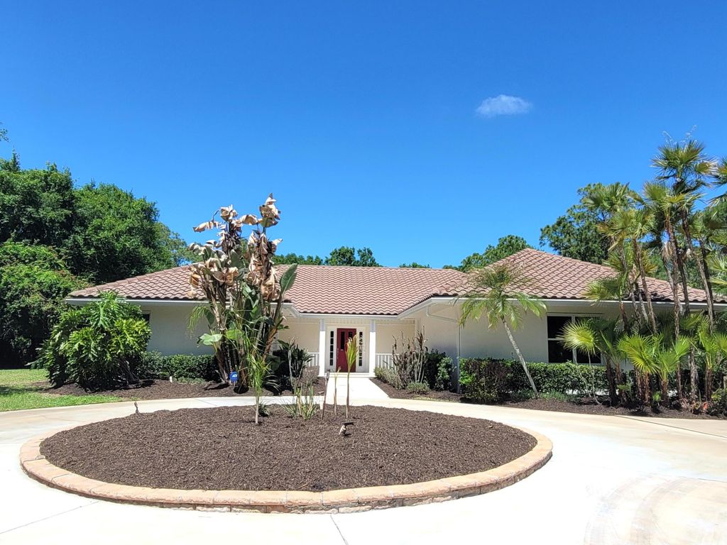 Photo of 7922 Steeplechase Lane, Port Saint Lucie, FL 34986 (MLS # B26011084)
