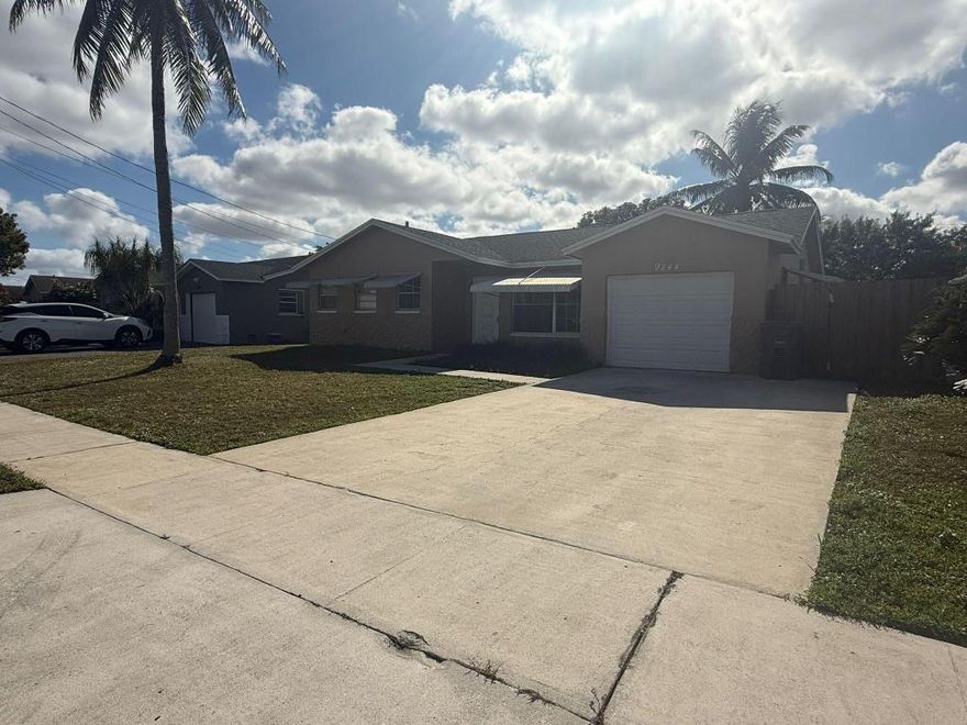 Beautiful 3 Bedroom 2 bath single family home in West Boca Raton. Upgraded kitchen, private backyard facing canal. NO HOA | Quick Move in