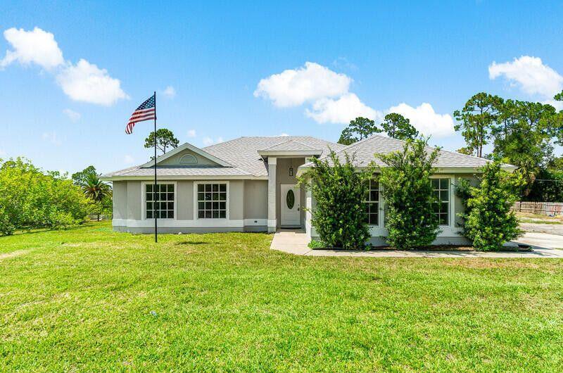 Amazing completely remodeled CBS single family home! This beauty has a brand new roof! Also there is a new kitchen with a large quartz island and upgraded stainless steel appliances and new white shaker contemporary cabinets. There is new vinyl flooring and new electrical & plumbing fixtures. The bathrooms also have new shower tile and new cabinets etc... Dont miss out to own this beautiful house in the Acreage!