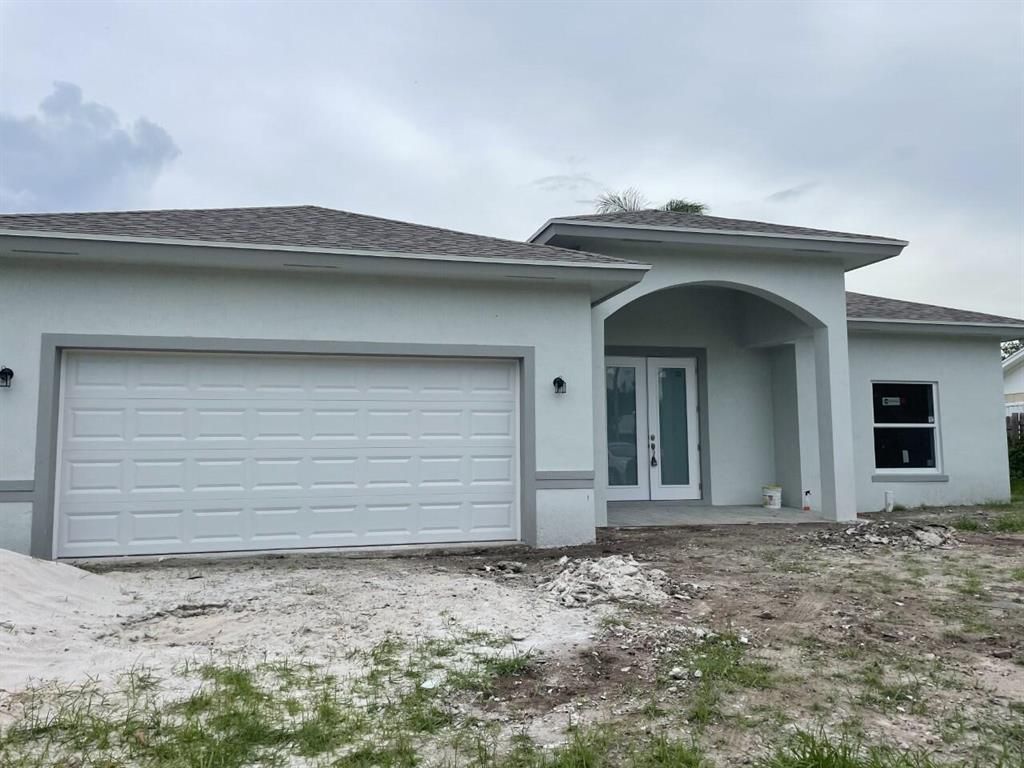 Photo of 3414 Florida Boulevard, Palm Beach Gardens, FL 33410 (MLS # R10738080)