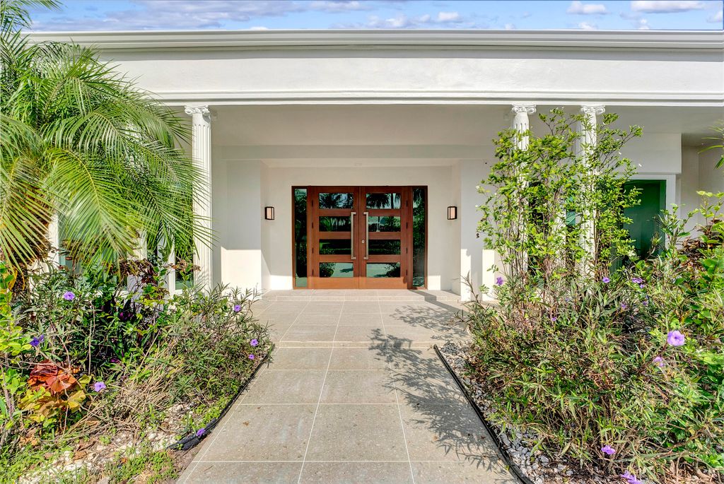 Photo of 625 Atlantis Estates Way, Atlantis, FL 33462 (MLS # R10952305)