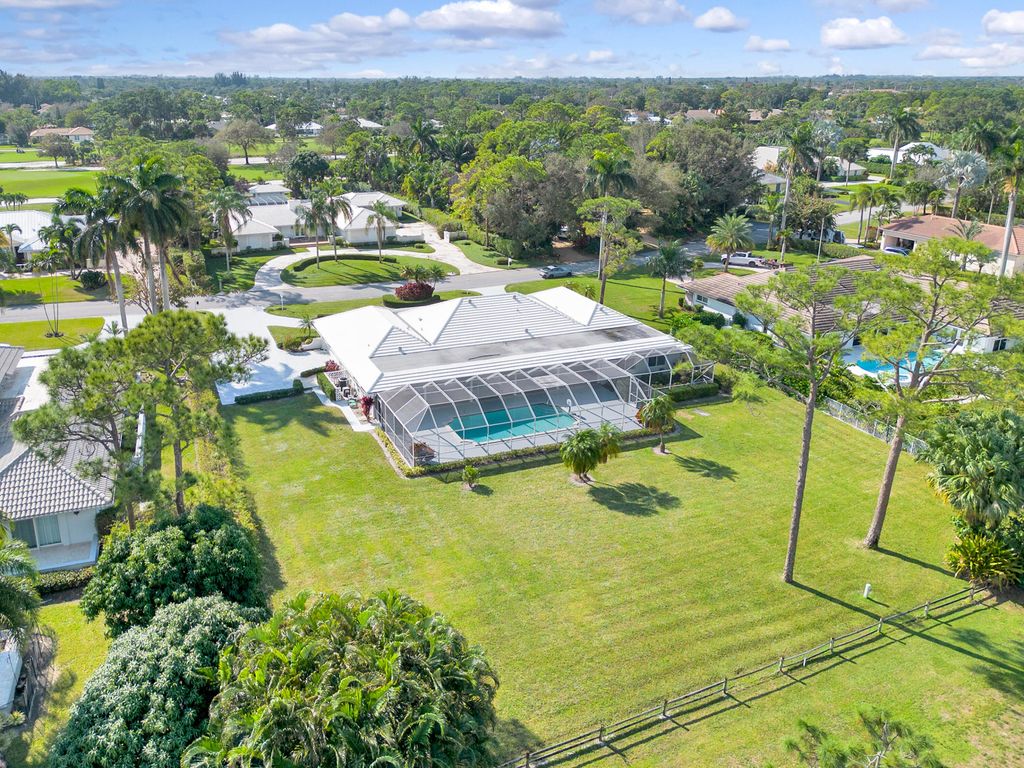 Photo of 625 Atlantis Estates Way, Atlantis, FL 33462 (MLS # R10952305)