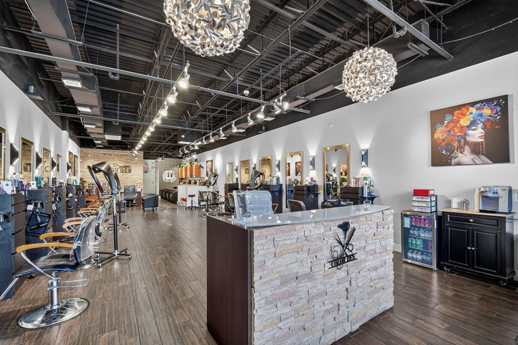 Photo of 7018 Charleston Shores Boulevard, Lake Worth, FL (MLS # B26014466)