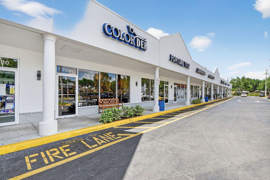 Photo of 7018 Charleston Shores Boulevard, Lake Worth, FL (MLS # B26014466)