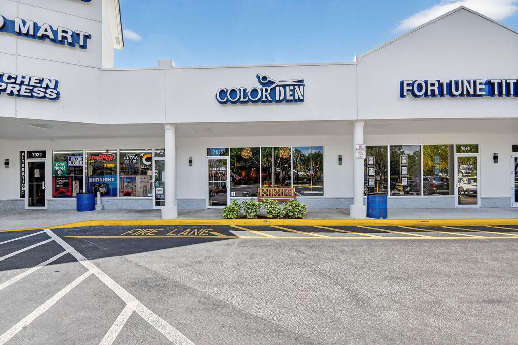 Photo of 7018 Charleston Shores Boulevard, Lake Worth, FL (MLS # B26014466)