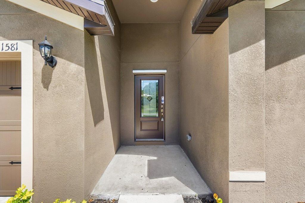 Photo of 1581 SW Underwood Avenue, Port Saint Lucie, FL 34953 (MLS # R11120153)