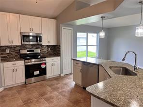 Photo of 1301 SW Gahaf Avenue, Port Saint Lucie, FL 34953 (MLS # B26042285)