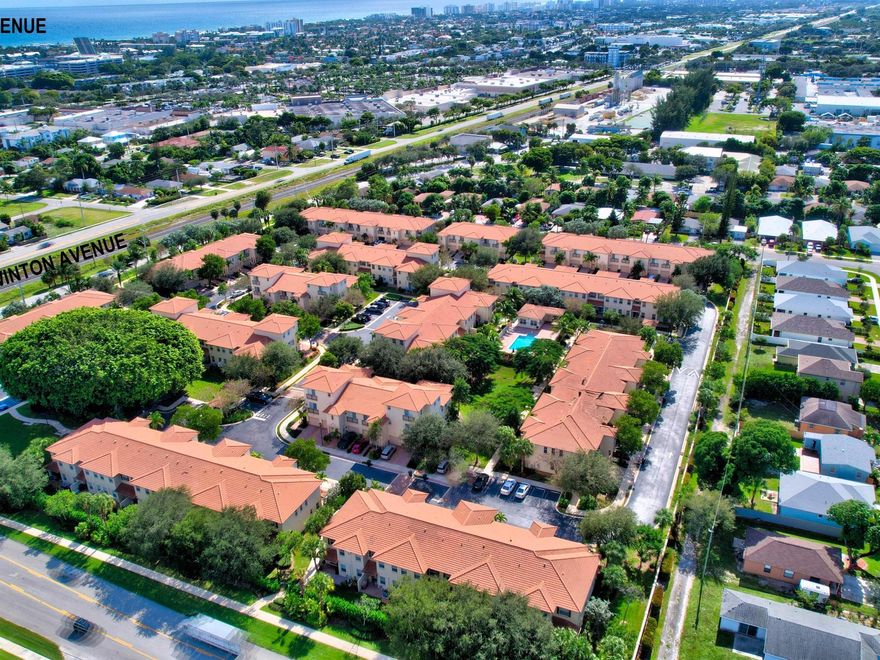 Just blocks from the vibrant Atlantic Avenue is a hidden gem of a community along historic, tree-lined Swinton Avenue. This is the perfect spot to begin the new year in Delray's charming Village by the Sea. This pet-friendly enclave offers walking paths, a community pool, fitness center, and a playground. The home features an inviting open layout connecting the living and dining areas to the kitchen with tile flooring, storage, and stainless steel appliances. The upstairs offers LVP flooring and three generous bedrooms, including a primary suite with double sinks, a separate shower, a soaking tub and a walk-in closet. A private brick-paved patio provides the ideal space for grilling or relaxing. A short bike ride to the beach, and the best shopping and Dining only minutes away.