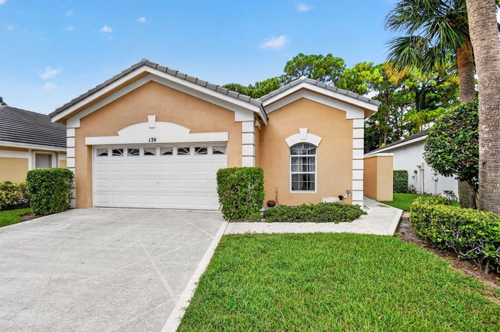 Photo 1 of 57 — 174 HARBOR LAKE Circle, Greenacres, FL 33413